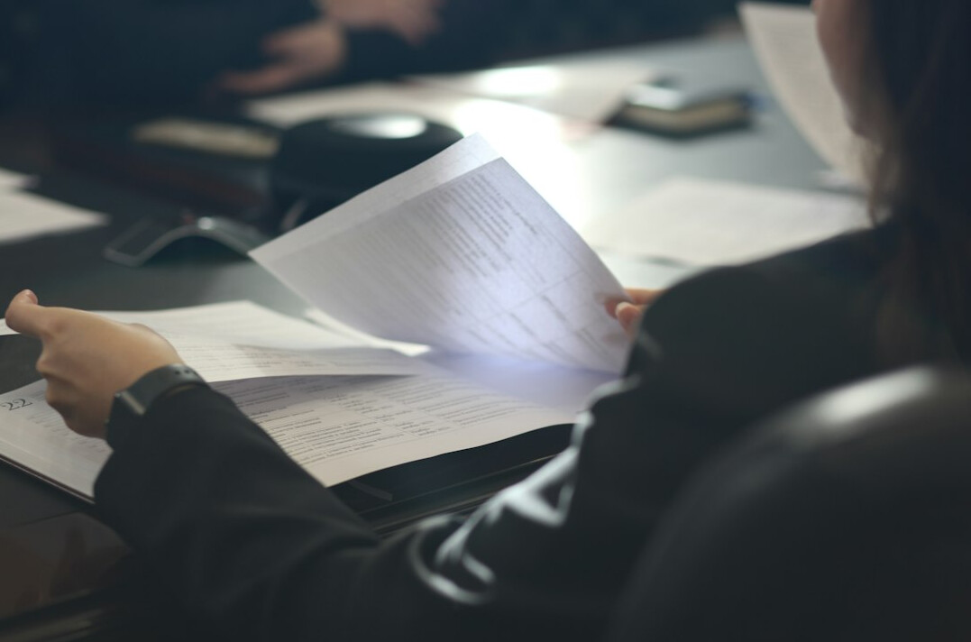 detective examining documents